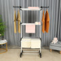 Herzberg HG-8034BW: Moving Clothes Rack - Black Plastic with White Tubes